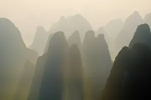 Guilin: 80185351 Limestone Karst Formations at Dawn Guilin