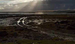 Rays: 80186726 Sunburst - over the coastline North Uist