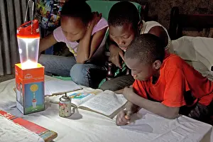 Powered: 80186928 African children studying school book with