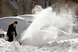 Clearing: 80187028 Snow - man clearing snow with snow shovel