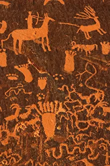 Carved: 80187851 Newspaper Rock - hunting scene carved in