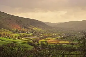 Robin Boswell: 80190137 Valley - sunshine shining on valley after