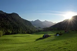 Slopes: 80190170 Sunset - over grass slopes and mountains