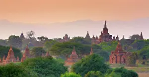 Burma: 80191488 Temples and pagodas at sunset on the Central