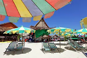 Multi: 80191534 Colourful beach umbrellas and deckchairs