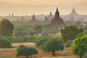 Burmese: 80194242 Temples and pagodas at sunset Central Plain