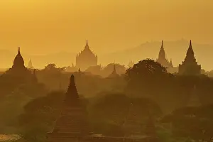 Burmese: 80194244 Temples and pagodas at sunset Central Plain
