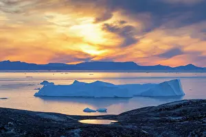 Ilulissat: 80200173 Icebergs - at sunset Ilulissat Icefjord