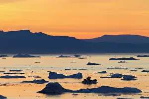Ilulissat: 80200185 Icebergs - at sunset Ilulissat Icefjord