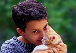 Frederic Rolland: 80202470 Boy with kitten Frederic Rolland All images