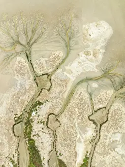 Tides: Abstract patterns at low tide in the marshland of the Nature Reserve La Breña y Marismas del Barbate