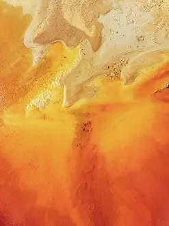 Pollution: Abstract patterns in a pool in the mineral-rich area of the Rio Tinto mines