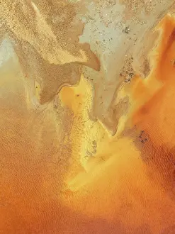 Pollution: Abstract patterns in a pool in the mineral-rich area of the Rio Tinto mines