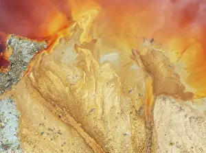 Pollution: Abstract patterns in a pool in the mineral-rich area of the Rio Tinto mines