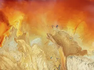 Pollution: Abstract patterns in a pool in the mineral-rich area of the Rio Tinto mines