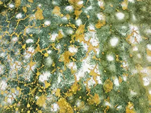 Saline: Abstract patterns in the shallow water of a saline pond in the marshland of the Bahía de Cádiz Nature Reserve