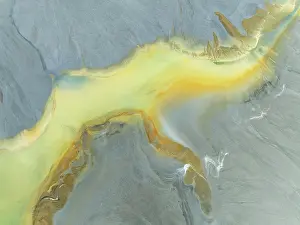 Pollution: Abstract patterns in a waste pond in the mineral-rich area of the Rio Tinto mines