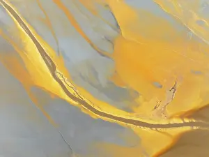 Pollution: Abstract patterns in a waste pond in the mineral-rich area of the Rio Tinto mines