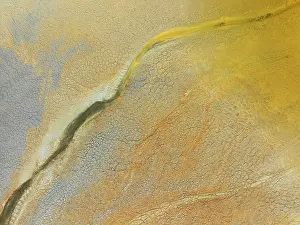 Pollution: Abstract patterns in a waste pond in the mineral-rich area of the Rio Tinto mines