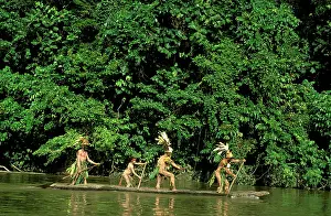 Paddling: Adults and child paddling canoe