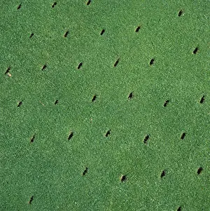 Golf: Aeration holes in turf grass