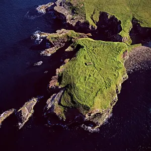 Headland: Aerial image of Scotland, UK: Brough of Deerness