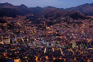 Population: Aerial of La Paz at dusk with pink light