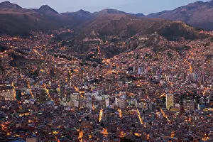 Population: Aerial of La Paz at dusk with pink light