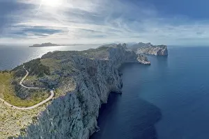 Roads: Aerial panorama landscape view of the curving road and rugged Cap de Formentor in northwestern Mallorca