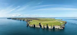 Stacks: Aerial panorama of the rugged coastal landscape a