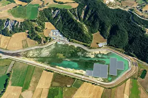 Powered: Aerial photo photovoltaics on a water retention