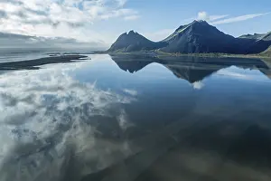 Estuary: Aerial view over the calm sea to Mt