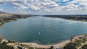 Aerials: Aerial view of the Chronicle of Georgia with the Tbilisi Sea in the background