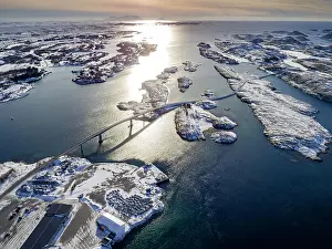 Settled: Aerial view, country road with bridge over the sea