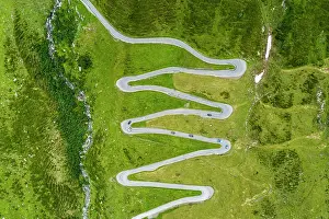 Curve: Aerial view, curvy mountain pass road Spl&, x2796ec21;ss