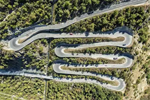 Chain: Aerial view, drone shot, Mountain pass road with