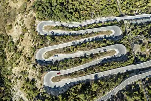 Chain: Aerial view, drone shot, Mountain pass road with