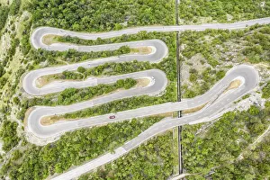 Chain: Aerial view, drone shot, Mountain pass road with