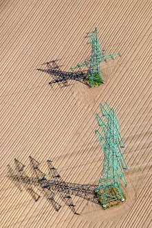 Cable: Aerial view of E-masts on a field, acre, arable