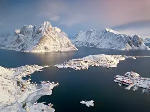 Townsmall: Aerial view, fishing village Reine in winter at