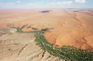 Belt: Aerial view of the flooding Kuiseb river and its
