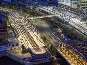 Bridge: Aerial view of the Hamburg Elbbrucken U4 underground and S-Bahn station at blue hour