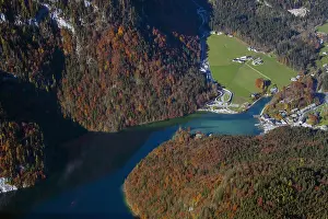 Upper: Aerial view over lake Knnigssee from the mountain