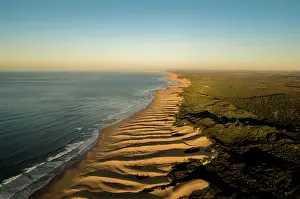 Breaker: Aerial view, long coast along sand dunes, Wild Coast