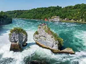 Tourists: Aerial view of the Rhine Falls, with tourists on