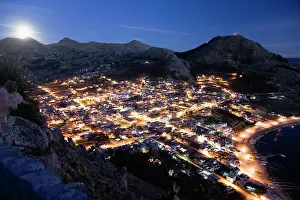 Moonlit: Aerial view of rising moon on beach of Copacabana