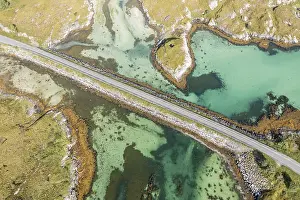 Line: Aerial view of road on a dam connecting islands