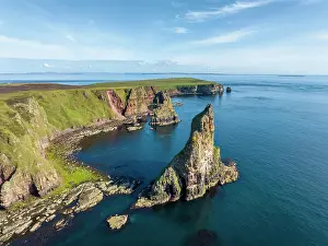 Stacks: Aerial view of the rugged coastal landscape with t