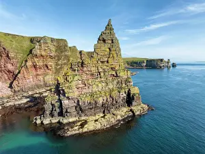 Stacks: Aerial view of the rugged coastal landscape with t