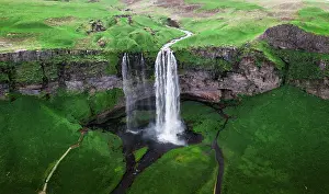 Spectacle: Aerial view, Seljalandsfoss waterfall falls from